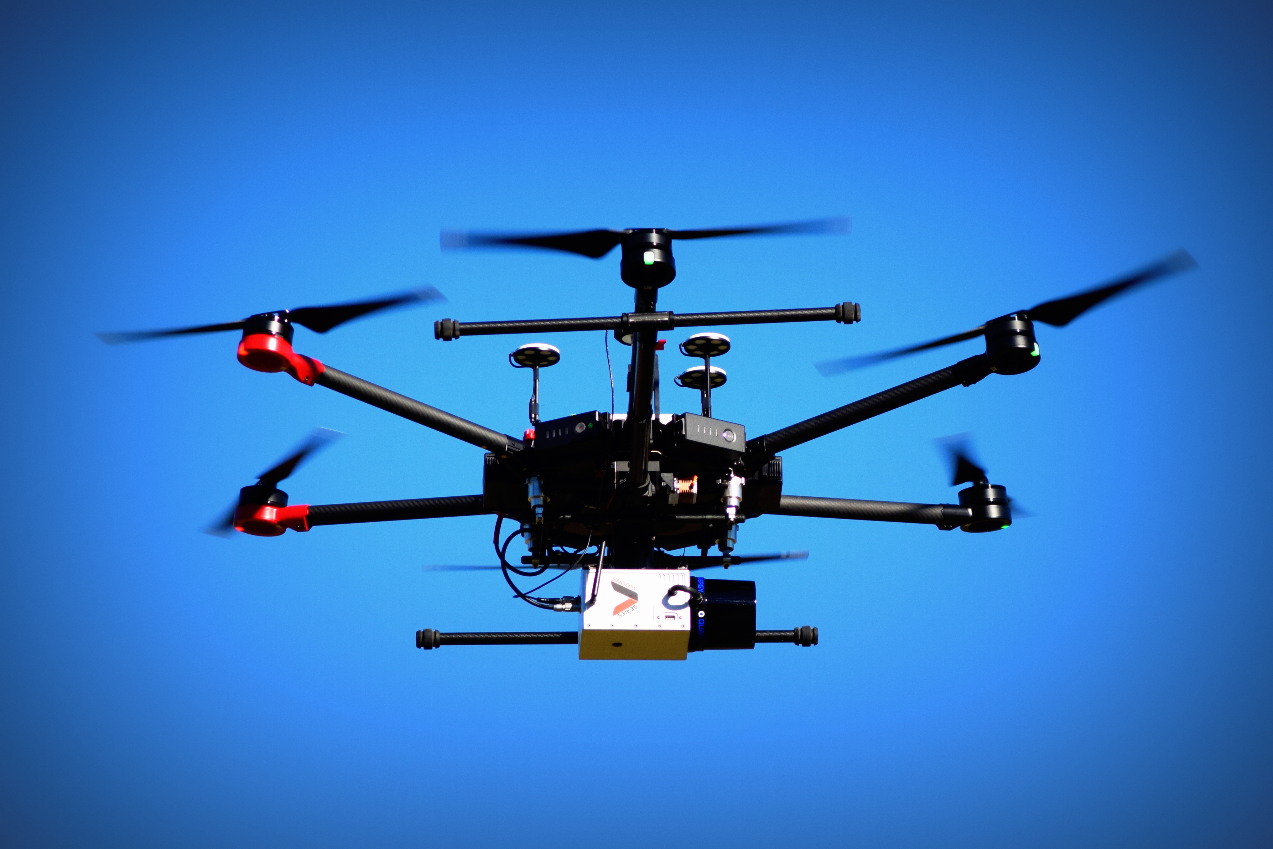 Drone mounted LiDAR. This technology is rapidly developing, with many companies working towards creating units capable of acquiring high density datasets over large areas. ('LiDARUSA Snoopy 120 LiDAR', @Clapurhands2019, CC-BY-SA-4.0).